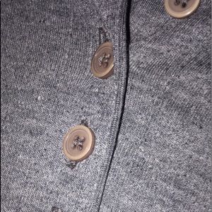 - grey long sleeve shirt